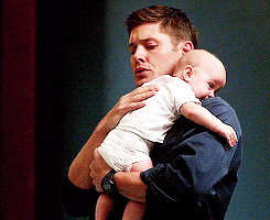 Dean Winchester holding baby